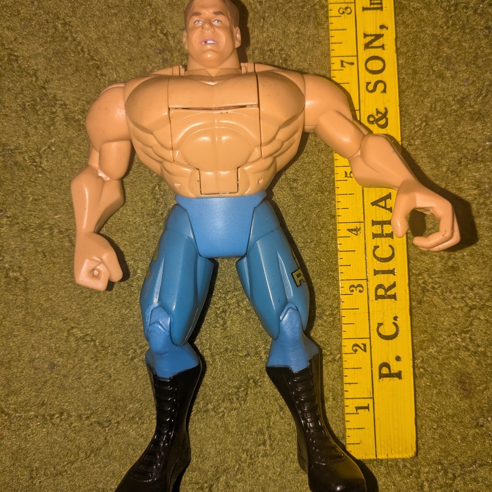 Action Figure with Blue Pants and Black Boots